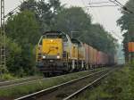 Der Tf von 7868 und 7867 hat am 26.07.2011 Zeit die Landschaft zu genieen. Mit einem langen Containerzug am Haken kommen die beiden belgischen Diesellok`s mit drhnenden Motoren im Schritttempo die Rampe der Montzenroute von Aachen West zum Gemmenicher Tunnel hoch.