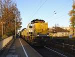 7866 und 7867 beide von der SNCB kommen die Kohlscheider-Rampe hoch aus Richtung Neuss,Herzogenrath mit einem Kurzen Kalkleerzug aus Oberhausen-West(D) nach Hermalle-Huy(B) und fahren durch Kohlscheid in Richtung Richterich,Laurensberg,Aachen-West. Bei schönem Herbstwetter am Nachmittag vom 29.10.2015.