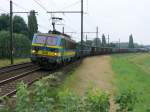 SNCB-Lok 1205 mit einem langen Gterzug auf der grossen Schleife in Ekeren auf dem Weg zum Verschiebebahnhof im Hafen von Antwerpen. Aufgenommen am 12/08/2009.