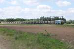 2013 ist hier auf die Schleife bei Ekeren eingebogen und rollt nun in Richtung Hafen. Im Hintergrund erkennt man ber den Baumwipfeln einige Krne des Antwerpener Hafens. Aufgenommen am 14/05/2011.