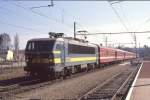 SNCB Elektrolok 2735 vor Altbau Wagen IC nach Lttich  im Bahnhof Eupen am 27.03.1991 um 11.00 Uhr