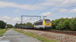 Lineas 1310 mit einem leeren Güterzug am 14.06.2019 in Hever Richtung Leuven.