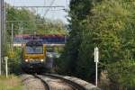 HLE 1314 befindet sich hier mit ihrem IC A Eupen - Oostende auf dem kurvigen eingleisigen Stck zwischen Eupen und Herbesthal in der Steigung bei Gemehret.