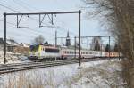 Heute stand in Welkenraedt ein Testzug mit den neuen Siemens EuroSprinter 1811 und 1860 an je einem Zugende. Nachts unternehmen sie Testfahrten auf der nahe gelegenen Hochgeschwindigkeitsstrecke. Softwareprobleme haben die Inbetriebnahme immer wieder hinausgezgert. Von einem Lokfhrer erfuhr ich, dass sie normalerweise ab Mrz 2011 im Personenverkehr eingesetzt werden sollen, und dort die Serie 13 ersetzen werden. Aufgenommen am 04/12/2010.