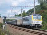 HLE 1803 mit IC A-Zug Eupen-Oostende bei Baelen mit 15 Minuten Versptung am 29.08.11.
