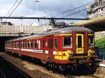 677 mit 5361 Lige Palais-Maastricht auf Bahnhof Lige Palais am 14-7-98. Bild und scan: Date Jan de Vries.