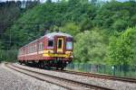 IR-Zug Lttich-Aachen (AM 65) auf der Kurve bei Goffontaine im Wesertal am 29.