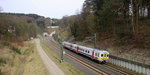 Ein Triebzug der SNCB 653 kommt  aus Aachen-Hbf nach Spa-Géronstère(B) und kamm gerade aus dem Aachener-Buschtunnel aus Richtung Aachen-Hbf und fährt in Richtung Hergenrath(B).
Aufgenommen von einer Fußgängerbrückein Preusswald bei Aachen. 
Bei Sonne und Wolken am Nachmittag vom 2.4.2016. 
