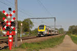 SNCB/NMBS Triebzug 08097 (Desiro) am 20.04.2019 in Testelt gen Aarschot.