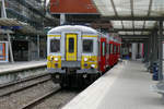 Triebzug 619 (AM 66) der SNCB/NMBS steht abfahrbereit im Bhf Leuven.