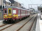 SNCB-Triebwagen 161 auf Gleis 2 im Bahnhof Welkenraedt bereit zur Abfahrt nach Spa-Gronstre. Im Hintergrunf erkennt man noch Lok 1604. Aufgenommen am 01/03/2009.