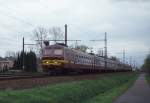 SNCB Elektrotriebzug 828 ist am 28.03.1997 um 09.04 Uhr bei Lint in Richtung  Br�ssel unterwegs.