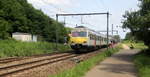 Ein Belgischer Triebzug 334 von der SNCB  und fährt durch Testelt(B) in Richtung Aarschot(B).
Aufgenommen von der Wijngaardstraat in Testelt(B).
Bei Sommerwetter am 1.6.2019.