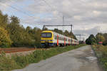 SNCB/NMBS-Triebzug 903 der Serie AM86 am 24.10.2019 in Hever auf dem Weg von Leuven in Richtung Mechelen.