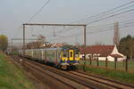 Belgium SNCB-NMBS  EMU's 982+xxx+xxx running a local train Aalst - Brussel-Zuid, in Sint-Martens-Bodegem  9/4/2010