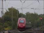 Bei Nieselregen unterwegs nach Aachen ist dieser Thalys.Hier zu sehen bei der 
Durchfahrt in Eschweiler (Kr.Aachen) auf der KBS 480.Aktuelles Bild vom 6.10.2012.