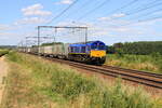 Belgiën   Lok 653-10 von Railtraxx mit Containerzug, in 's Herenelderen  3/8/2022