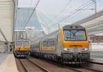 Der IC507 aus Oostende nach Eupen mit Schublok 1358 bei der Einfahrt in Lige-Guillemins, 4.8.10