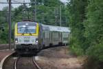 Ein Zug von M6-Wagen und eine EuroSprinter-Lok sind im Bhf Tongeren abgestellt. Juni 2012.