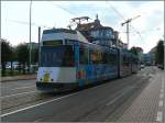 Tramwagen 6032 mit seiner Vollwerbung fr ein Wohnprojekt in De Haan wird in Krze die Haltestelle Blankenberge Station erreichen.