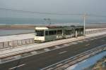 Die Kusttram am Strand von Oostende auf dem Weg gen Sden zwischen den Stationen Oostende-Ravelingen und Oostende-Raversijde; 27.11.2010