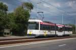  Kusttram  BN Nr.6025 fährt durch die Dünen bei Groenendijk. August 2014.