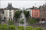 . Blick in die Emiel Banningstraat -

Vom Antwerpener Jusitzgebäude aus geht der Blick über den Bolivarplaats in die Emiel Banningstraat, durch die gerade bei regnerischem Wetter eine Albatros auf der Linie 4 unterwegs ist.

20.06.2016 (M)