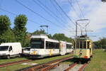 Belgium, Coastal tramline Knokke - Oostende - De Panne  Tramways 6046 on a regular service and preserved tram 354 from Gent  De Haan aan Zee  8/8/2015