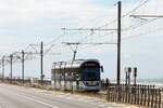 DE LIJN 6119 (Type Urbos 100X  Stadslijner ) am 27.Juli 2026 bei der Kusttram Station Raversijde-Provinciedomein.