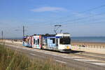 Belgium, Coastal tramline Knokke - Oostende - De Panne  Tramway 6011 along the North Sea between Middelkerke and Oostende  22/8/2015