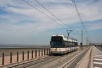 Belgium, Coastal tramline Knokke - Oostende - De Panne
Tramway 7225 in Mariakerke along the North Sea
19/7/2010
During the holiday season, Antwerpen and Gent lend a few trams to the coastal line.