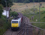 186 319-0 der Euro-Cargo-Rail l kommt aus Richtung Aachen-West und fährt die Gemmenicher-Rampe hoch mit einem Schrottzug aus Köln-Kalk(D) nach Genk-Goederen(B)  und am Ende fährt 185