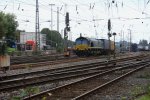 Die Class 66 PB15 von Ascendos Rail Leasing fhrt mit einem Containerzug von Aachen-West nach Belgien bei Wolken.