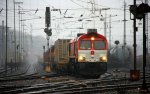 Die Class 66 DE6312  Alix  von Crossrail fhrt mit einem Containerzug von Aachen-West nach Belgien bei Regenwetter am 18.2.2012.