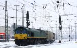 Die Class 66 PB20 von  Railtraxx BVBA fhrt mit einem langen Containerzug von Aachen-West nach Belgien bei Ausfahrt aus Aachen-West und fhrt in Richtung Montzen/Belgien  bei starken Schneefall am Eiskalten 24.2.2013.