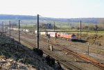 Die Class 66 PB13   Ilse  von Crossrail kommt aus Richtung Vise(B) mit einem langen Containerzug aus Genk-Zuid-Haven(B) nach Gallarate(I) und fhrt in Richtung Aachen-West.
Aufgenommen in Montzen-Gare(B) bei Sonnenschein am 2.4.2013.