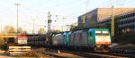 Zwei Cobra 2843 und 2823  kommen mit einem Kalkzug aus Yves-Gomeze(B) nach Millingen und fahren in Aachen-West ein,
und im Hintergrund steht die Class 66 DE6312  Alix  von Crossrail in der Abendsonne am 24.4.2013.