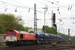 Die Class 66 DE6311  Hanna  von Crossrail fhrt mit einem sehr langen Dacia-Autozug aus Ciumesti(RO) nach Tongeren(B) bei der Ausfahrt aus Aachen-West und fhrt in Richtung Montzen/Belgien bei Wolken am Abend des 30.4.2013.