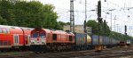 Die Class 66 DE6311  Hanna  von Crossrail fhrt mit einem Bulkhaul-Ganzzug aus Melzo(I) nach Zeebrugge-Ramskapelle(B) bei der Ausfahrt aus Aachen-West und fhrt in Richtung Montzen/Belgien bei Sonne