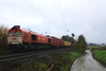 Die Class 66 DE6312  Alix  von Crossrail kommt aus Richtung Aachen-West und fhrt die Gemmenicher-Rampe hoch mit einem sehr langen MSC-Containerzug aus Weil Am Rhein(D) nach Antwerpen-Berendrecht(B). Aufgenommen an der Montzenroute am Gemmenicher-Weg am 24.11.2013.