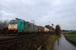 Die Cobra 2805 schleicht im Schneckentempo die Gemmenicher-Rampe hoch aus Richtung Aachen-West und fährt in Richtung Montzen/Belgien mit einem langen Containerzug aus Gallarate(I) nach Antwerpen-Oorderen(B).
Aufgenommen auf der Montzenroute am Gemmenicher-Weg bei Sonne und Wolken am Nachmittag vom 8.12.2013.  