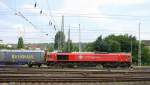 Die Class 66 DE6311  Hanna  von Crossrail fährt viel Dieselpower fährt mit einem langen Bulkhaul-Ganzzug-Containerzug aus Melzo(I) nach Zeebrugge-Ramskapelle(B) bei Ausfahrt aus Aachen-West