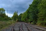 Traurige Stimmung einer einst bedeutenden Bahnstrecke die heute nur noch von einem Verein erhalten und gepflegt wird. Heute sieht man hier nur noch Relikte aus vergangener Zeit. Blick aus Raeren in Richtung Eupen 08.10.2016