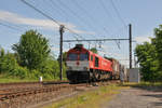 Mit einem LKW-Zug am Haken rollt die 266 284 alias DE6314 von Crossrail durch Bassenge Richtung Tongeren.