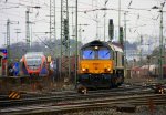 Die Class 66 DE6302 von DLC Railways fhrt mit einem Containerzug von Aachen-West nach Belgien bei Regenwetter am 15.2.2012.