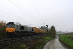 Die Class 66 DE6306 von DLC Railways kommt die Gemmenicher-Rampe hochgefahren mit einem P&O Containerzug aus Gallarate(I) nach Zeebrugge(B) aus Richtung Aachen-West und fhrt in Richtung Montzen(B).