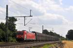 DB Schenker Rail Scandinavia 185 323 ist mit einem Schiebewandwagenzug am 30.06.12 bei Diepholz in Richtung Bremen unterwegs.