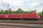 Seitenportrait von EG 3105 (91 86 0103 105-0 DK-DBCSC), als diese am Mittag des 19.07.2019 zusammen mit EG 3113 und einem gemischten Güterzug durch den Bahnhof von Hamburg Harburg in Richtung
