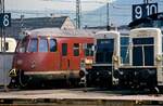 Ein Zug der DB-Baureihe 456 (Nahverkehrsschnellzug  ET 56) sowie die DB-Dieselloks 290 082-7 und 260 935-2 vor dem Bahnbetriebswerk Heidelberg.