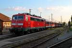 Am Morgen des 23.04.2014 stand die Freiburger 111 050-1 (FAL/RF/22.10.2014) mit ihrer n-Wagen Garnitur auf einem der stromlosen Abstellgleisen von DB Regio in Offenburg.